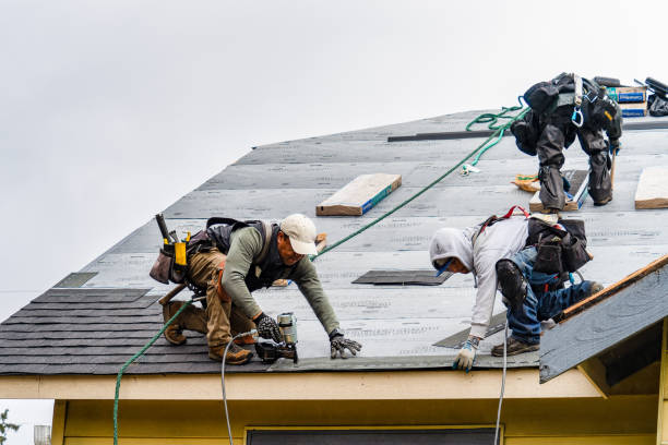 Professional Gutter Installation technician working in Otis, OR